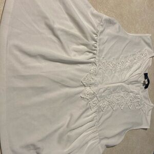 Women’s size S sleeveless off white top with embroidery